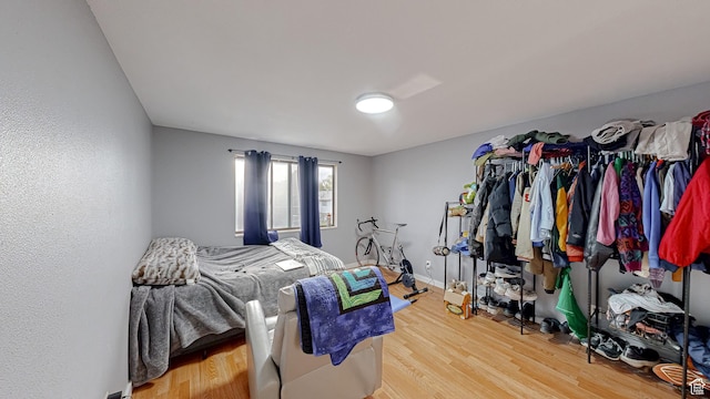 bedroom with light wood-type flooring