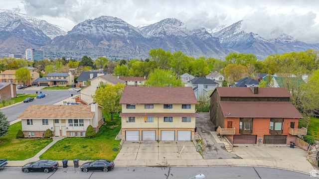 birds eye view of property featuring a residential view and a mountain view