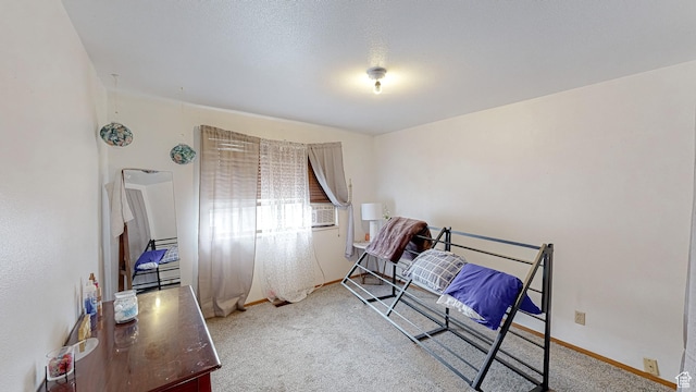 carpeted bedroom with baseboards