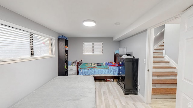 bedroom with light wood-style flooring