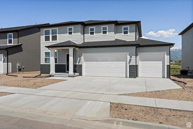 3448 S 3100 W Unit 153, West Haven, UT 84401 - view of front of home with concrete driveway and an attached garage