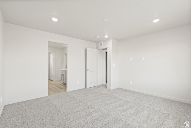 3448 S 3100 W Unit 153, West Haven, UT 84401 - empty room with light colored carpet and recessed lighting