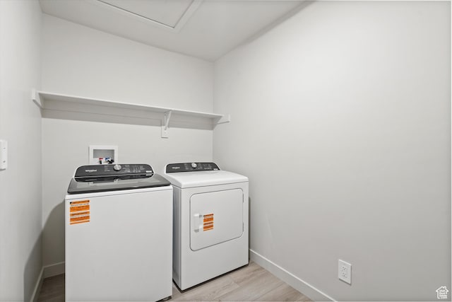 3448 S 3100 W Unit 153, West Haven, UT 84401 - washroom featuring washer and dryer and light wood-style floors
