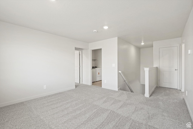3448 S 3100 W Unit 153, West Haven, UT 84401 - spare room with washer and clothes dryer, light carpet, and recessed lighting