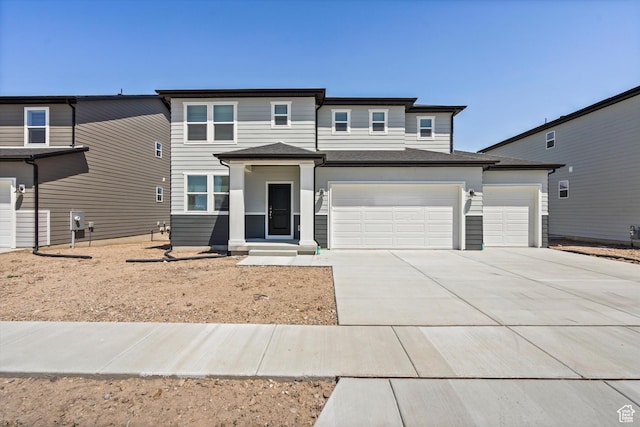 3448 S 3100 W Unit 153, West Haven, UT 84401 - view of front of property featuring driveway and an attached garage