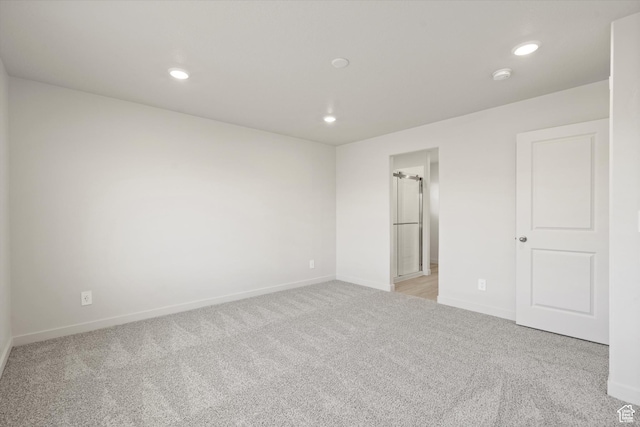3448 S 3100 W Unit 153, West Haven, UT 84401 - unfurnished bedroom with light colored carpet and recessed lighting