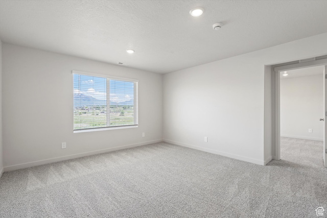 3448 S 3100 W Unit 153, West Haven, UT 84401 - carpeted spare room with a smoke detector and recessed lighting