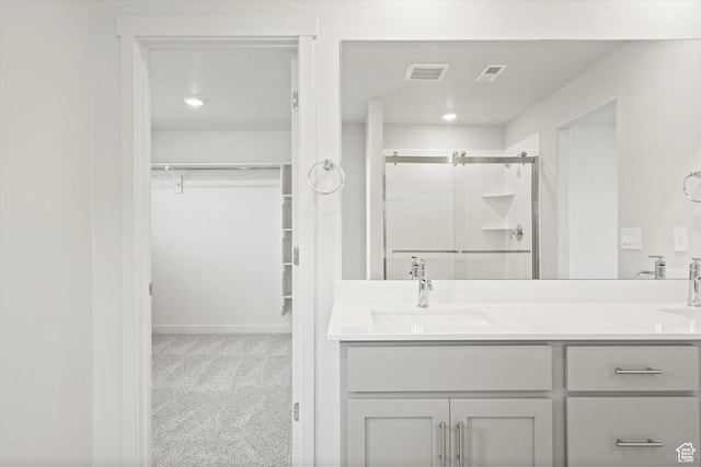 3448 S 3100 W Unit 153, West Haven, UT 84401 - bathroom with a shower stall, double vanity, and a walk in closet