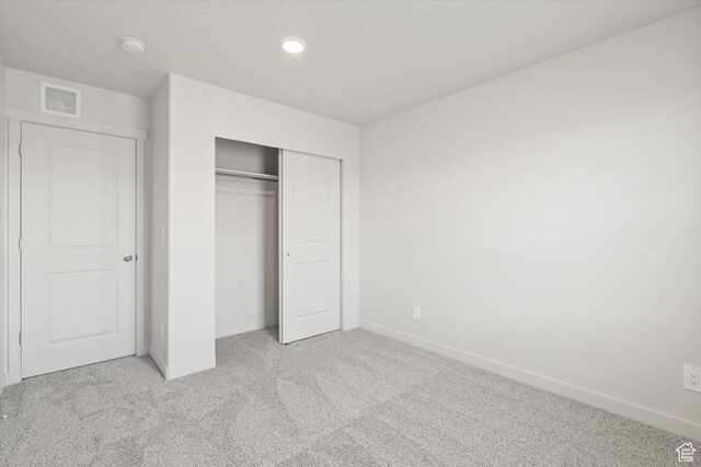 3448 S 3100 W Unit 153, West Haven, UT 84401 - unfurnished bedroom with light colored carpet and a closet