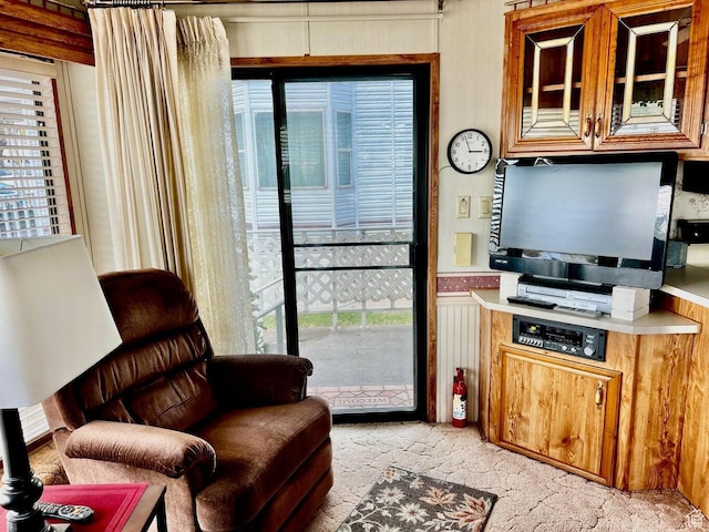 1150 W Red Hills Pkwy Unit 21, Washington, UT 84780 - kitchen with glass insert cabinets and light countertops