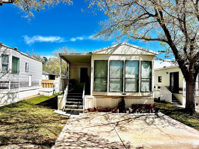 manufactured / mobile home featuring a patio area