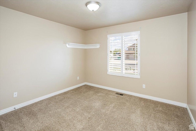 5195 S 5825 W, Hooper, UT 84315 - spare room featuring baseboards, visible vents, and carpet