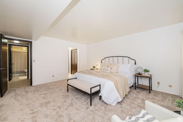 325 E 2550 N Unit 4, North Ogden, UT 84414 - bedroom with baseboards, ensuite bathroom, and carpet flooring