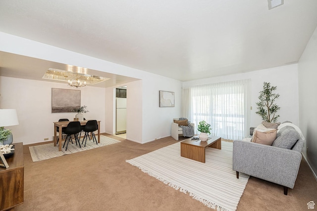 325 E 2550 N Unit 4, North Ogden, UT 84414 - living area with carpet flooring and a chandelier