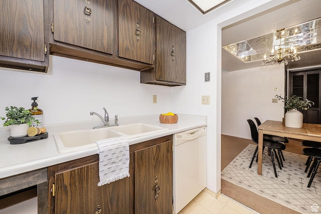 325 E 2550 N Unit 4, North Ogden, UT 84414 - kitchen featuring light countertops, a sink, white dishwasher, dark brown cabinetry, and a chandelier