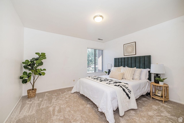 325 E 2550 N Unit 4, North Ogden, UT 84414 - bedroom with baseboards, visible vents, and carpet