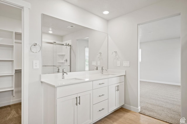 3444 S 3100 W Unit 154, West Haven, UT 84401 - full bath featuring a spacious closet, double vanity, a shower stall, baseboards, and recessed lighting