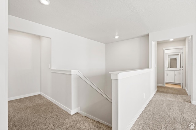 3444 S 3100 W Unit 154, West Haven, UT 84401 - corridor with an upstairs landing, carpet, recessed lighting, and baseboards