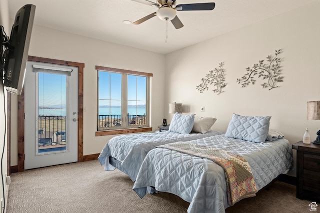 1428 N Broad Hollow Rd, Garden City, UT 84028 - bedroom with ceiling fan, access to exterior, carpet flooring, and multiple windows