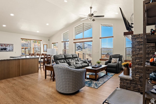 1428 N Broad Hollow Rd, Garden City, UT 84028 - living room featuring high vaulted ceiling, ceiling fan, recessed lighting, and light wood-style flooring