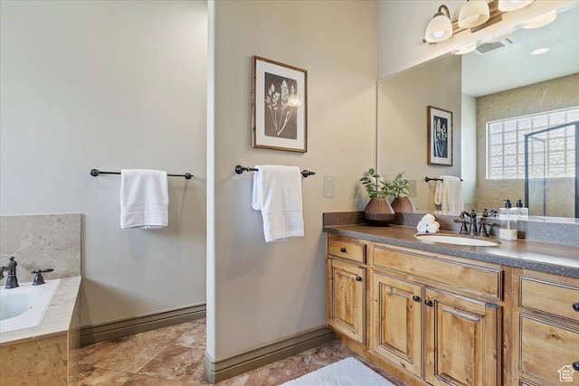5328 N 3275 E, Liberty, UT 84310 - bathroom featuring a bath, vanity, and visible vents