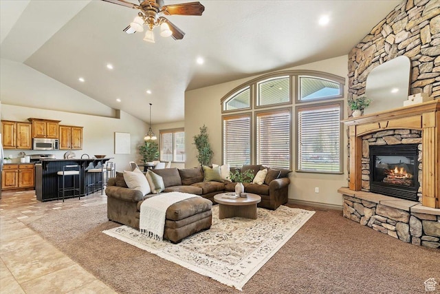 5328 N 3275 E, Liberty, UT 84310 - living room featuring high vaulted ceiling, recessed lighting, ceiling fan with notable chandelier, and a fireplace