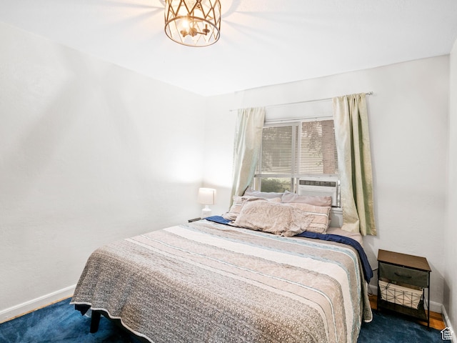 carpeted bedroom with baseboards