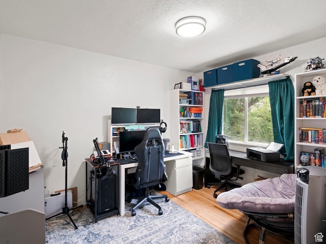 office area with wood finished floors