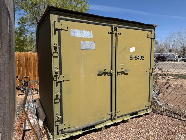 532 N 300 E, Roosevelt, UT 84066 - view of outdoor structure featuring fence and an outbuilding
