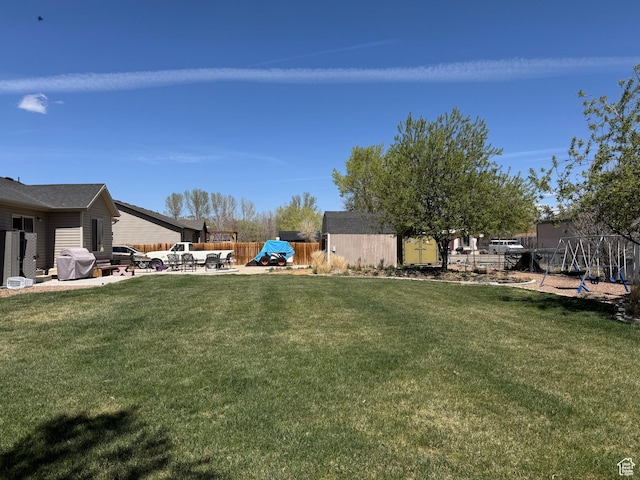 532 N 300 E, Roosevelt, UT 84066 - view of yard featuring fence, a patio, and a playground