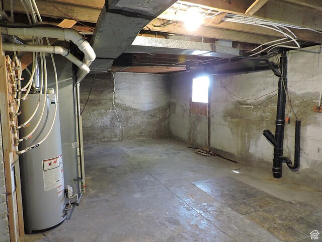basement featuring water heater