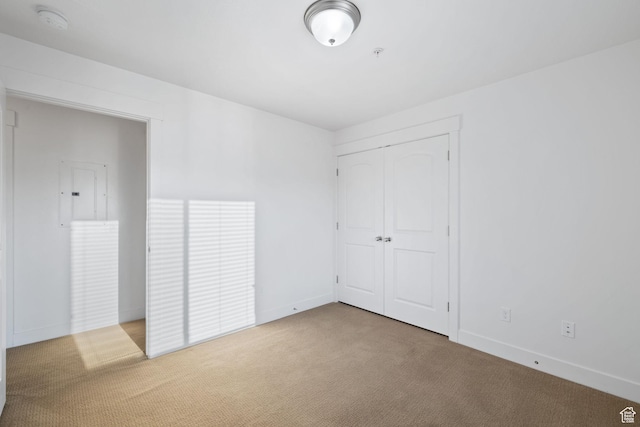 1045 S 1700 W Unit 1032, Payson, UT 84651 - unfurnished bedroom featuring baseboards, a closet, and carpet