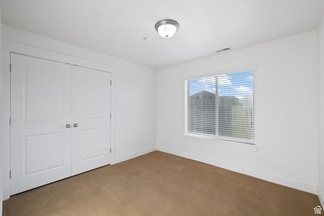 1045 S 1700 W Unit 1032, Payson, UT 84651 - unfurnished bedroom with a closet, carpet floors, visible vents, and baseboards