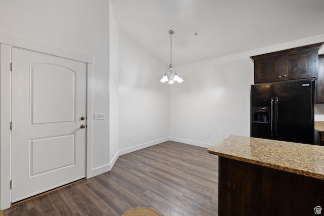 1045 S 1700 W Unit 1032, Payson, UT 84651 - kitchen with dark brown cabinets, light stone countertops, dark wood-style flooring, a notable chandelier, and black fridge