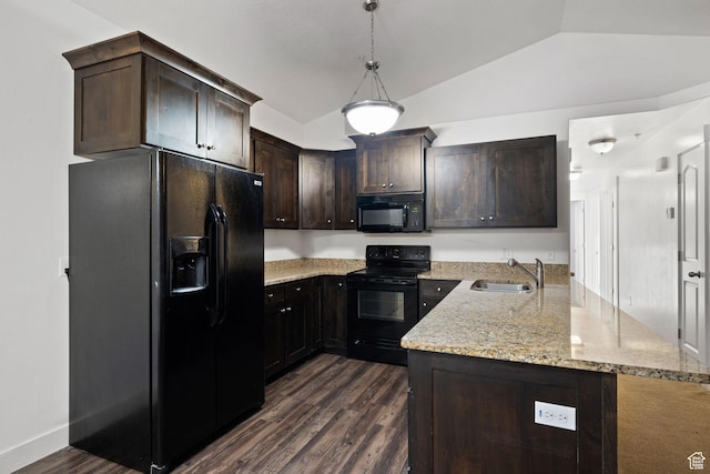 1045 S 1700 W Unit 1032, Payson, UT 84651 - kitchen with dark brown cabinets, a sink, light stone countertops, black appliances, and a peninsula