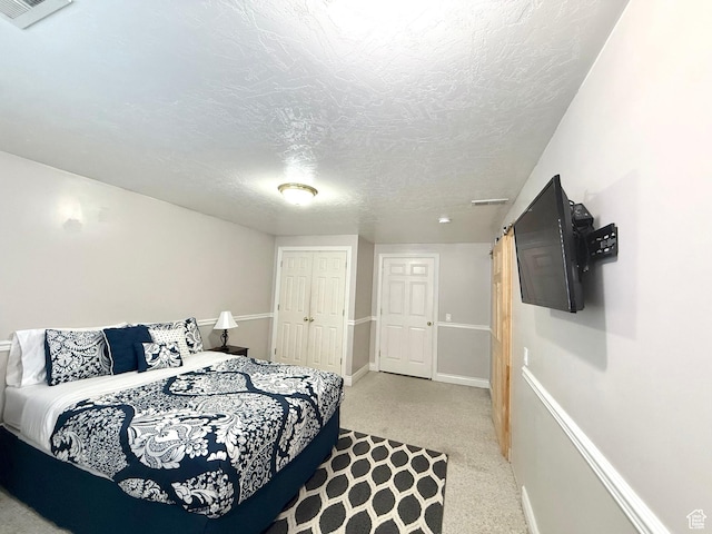 909 E 1520 N, American Fork, UT 84003 - bedroom featuring carpet flooring, a textured ceiling, baseboards, and a closet