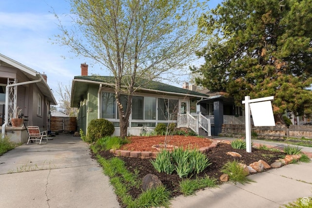 751 E Browning Ave S, Salt Lake City, UT 84105 - bungalow with a chimney and fence