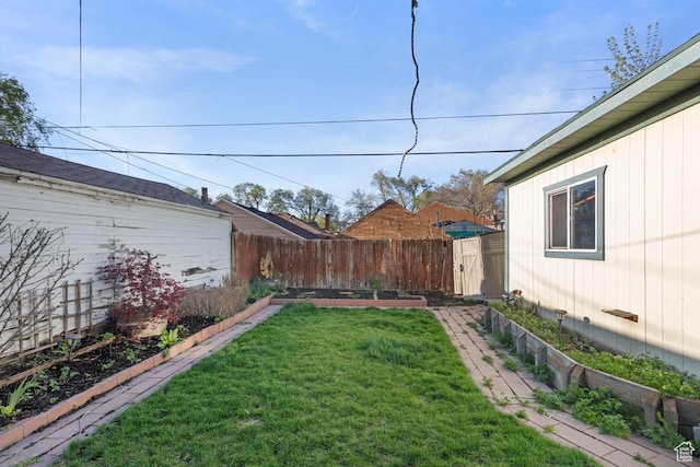 751 E Browning Ave S, Salt Lake City, UT 84105 - view of yard with a vegetable garden and a fenced backyard