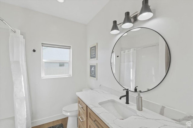 733 E 750 S, Preston, ID 83263 - bathroom with wood finished floors, vanity, baseboards, toilet, and a shower with shower curtain