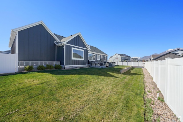 788 N 2100 E, Spanish Fork, UT 84660 - back of property featuring a lawn, board and batten siding, and a fenced backyard