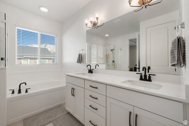 788 N 2100 E, Spanish Fork, UT 84660 - bathroom featuring a sink, double vanity, a stall shower, and a bath