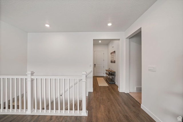 788 N 2100 E, Spanish Fork, UT 84660 - hall featuring baseboards, visible vents, wood finished floors, and an upstairs landing