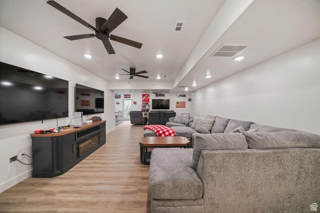 788 N 2100 E, Spanish Fork, UT 84660 - living area with a ceiling fan, baseboards, visible vents, and light wood-style floors