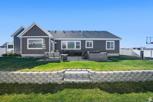788 N 2100 E, Spanish Fork, UT 84660 - rear view of house featuring fence, board and batten siding, a patio area, a hot tub, and a yard