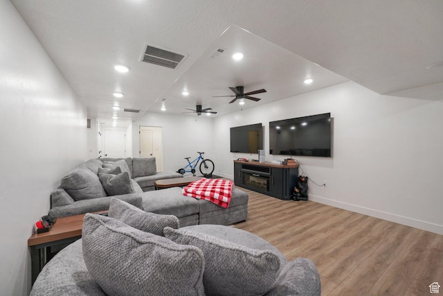 788 N 2100 E, Spanish Fork, UT 84660 - living room featuring visible vents, light wood finished floors, ceiling fan, and baseboards