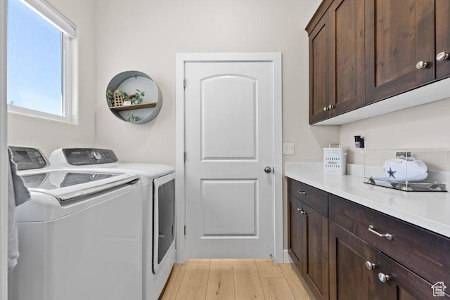 1920 W 180 N, Hurricane, UT 84737 - laundry area with cabinet space, light wood-style flooring, and independent washer and dryer