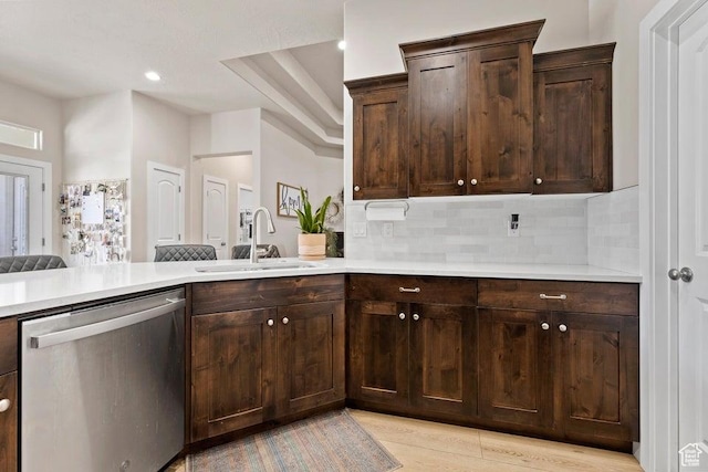1920 W 180 N, Hurricane, UT 84737 - kitchen featuring decorative backsplash, stainless steel dishwasher, a sink, and light countertops