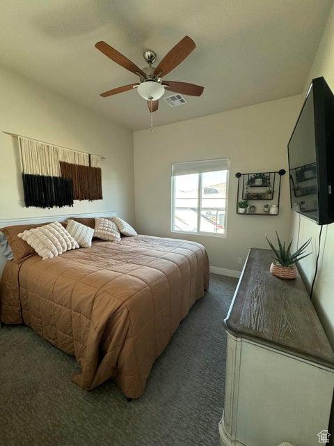 1920 W 180 N, Hurricane, UT 84737 - bedroom featuring visible vents, baseboards, carpet, and ceiling fan