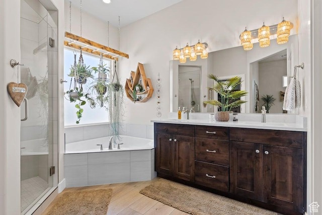 1920 W 180 N, Hurricane, UT 84737 - full bathroom featuring wood finished floors, a sink, a shower stall, and double vanity