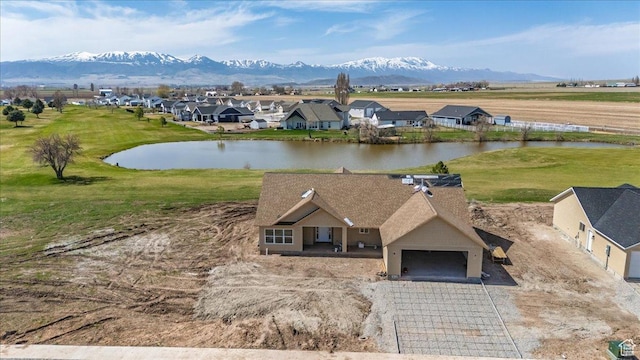 bird's eye view featuring a water and mountain view and a residential view